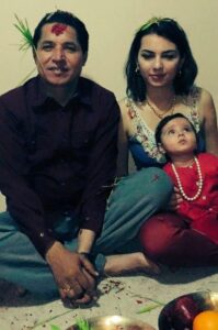 Rishi Dhamala with his family